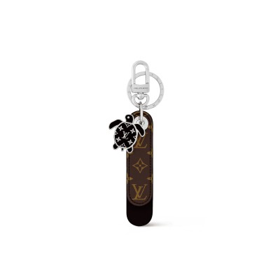 LOUIS VUITTON DRAGONNE TAB KEY HOLDER AND BAG CHARM M02566